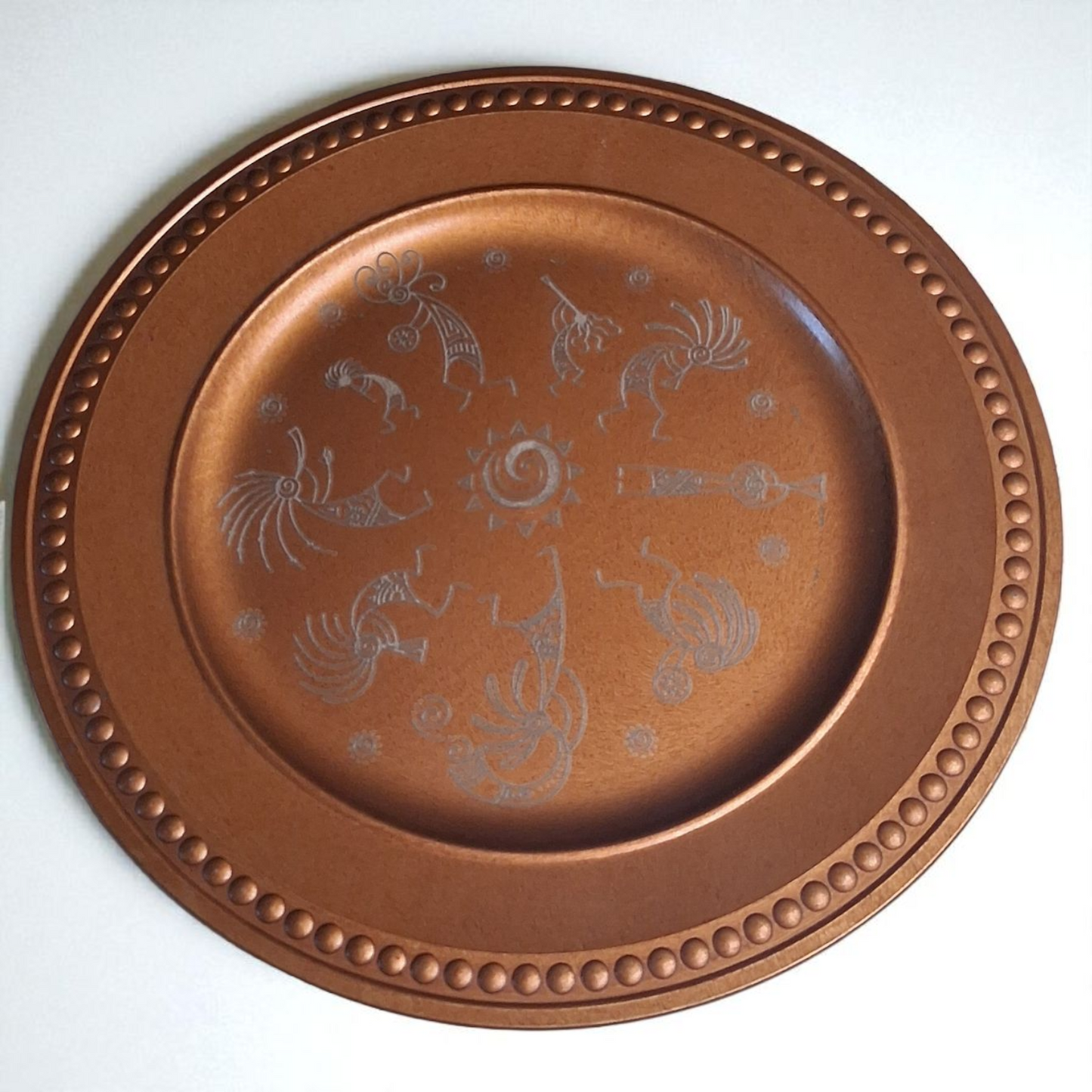 Engraved Copper-Tone Plate – 12" Round Decorative Tray with Tribal Sun & Dancer Design