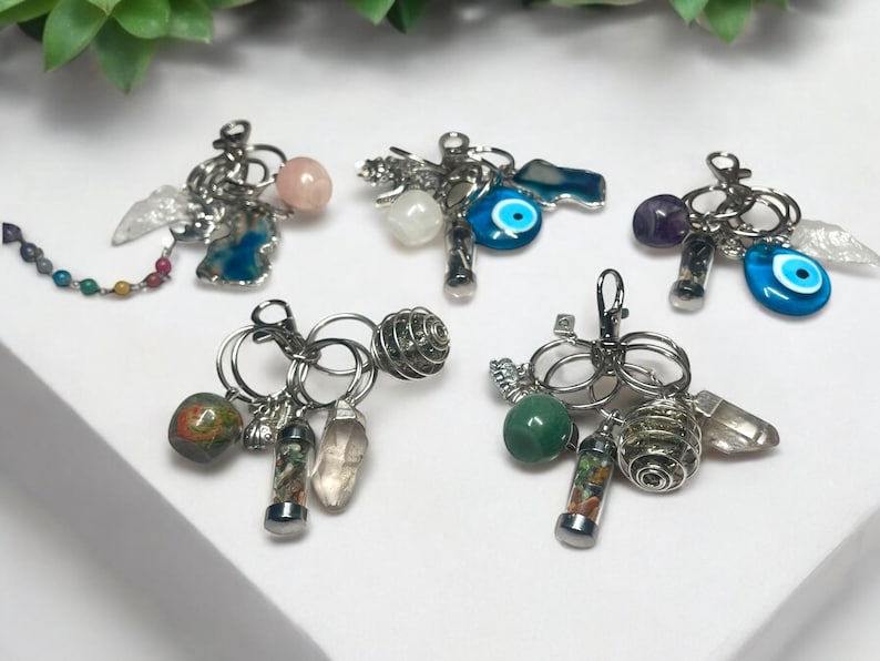 Grounding & Abundance Crystal Keychain Set – Pyrite Spiral, Smoky Quartz Point, Unakite Apple, Mini Gem Jar & Lucky Charms