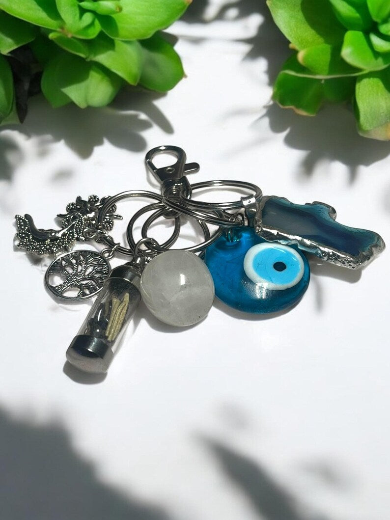 Protection & Energy Crystal Keychain Set – Evil Eye, Agate Slice, Moon & Sun Charms, Tree of Life, and Mini Spell Jar