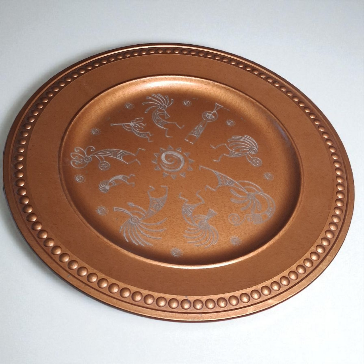 Engraved Copper-Tone Plate – 12" Round Decorative Tray with Tribal Sun & Dancer Design