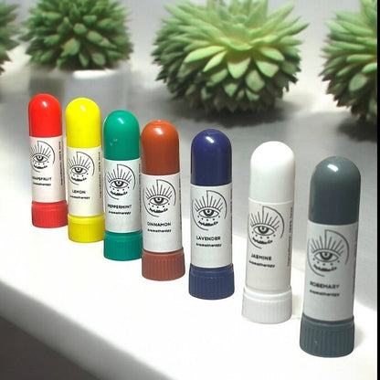 JoyfulBliss Co. aromatherapy inhaler set with seven colorful essential oil sticks for mood and relaxation support.