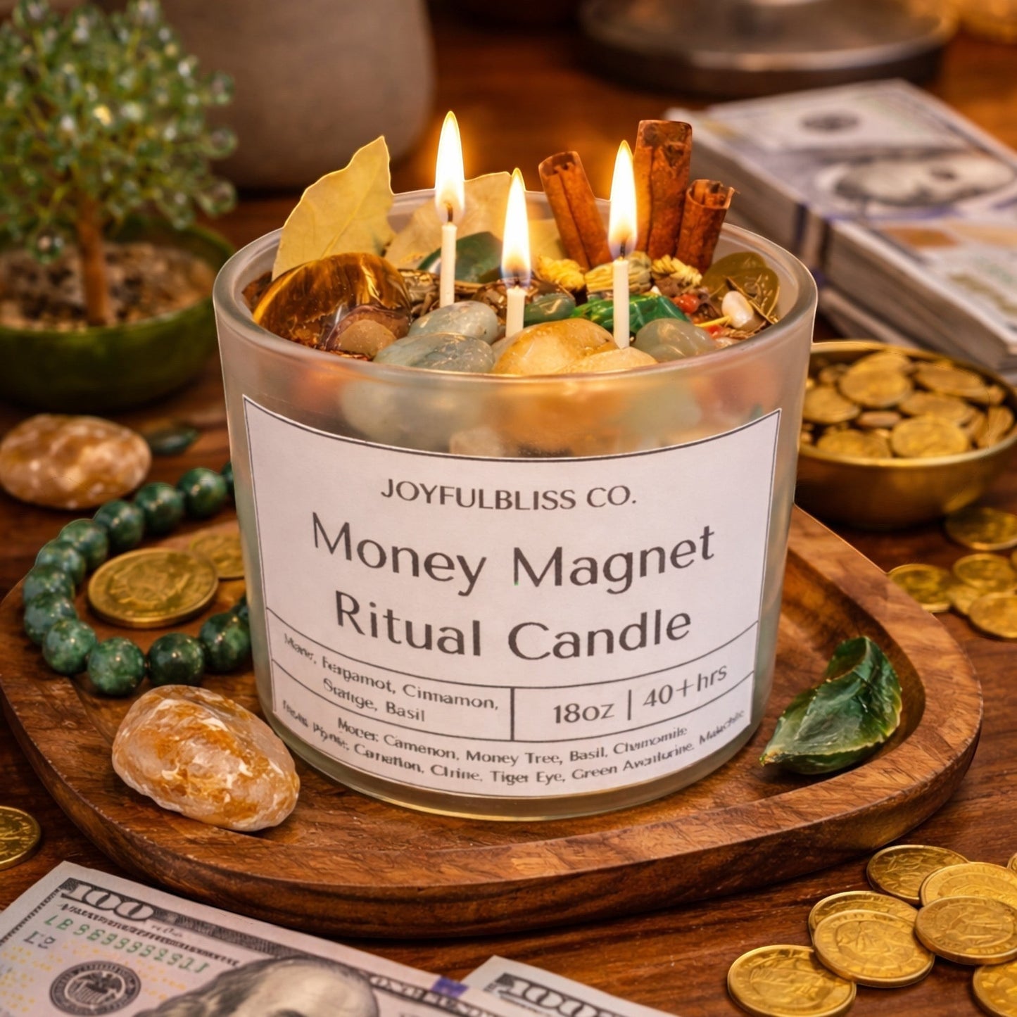 JoyfulBliss Co. Money Magnet ritual candle in a frosted glass jar with crystals, botanicals, and a triple cotton wick.