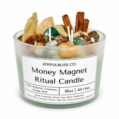 JoyfulBliss Co. 18oz Money Magnet ritual candle in a frosted glass jar with crystals, cinnamon sticks, and botanicals.