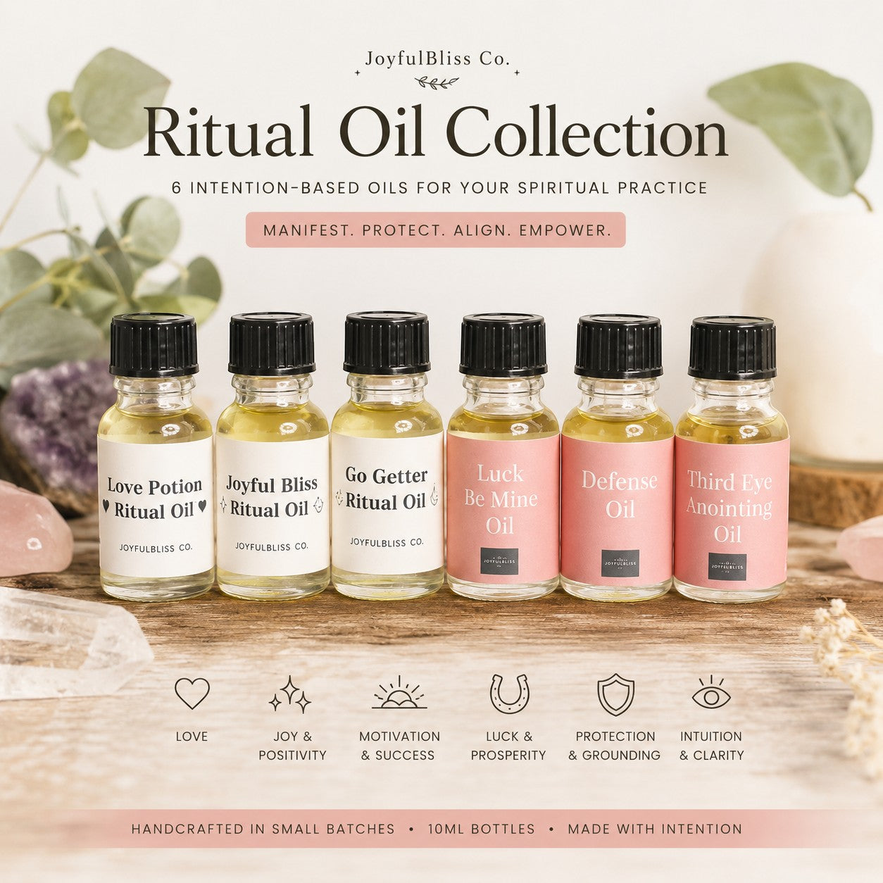 JoyfulBliss Co. set of six handcrafted ritual oils for manifestation, protection, and spiritual practice on a wooden table.