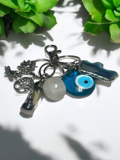 Protection & Energy Crystal Keychain Set – Evil Eye, Agate Slice, Moon & Sun Charms, Tree of Life, and Mini Spell Jar