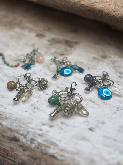 Spiritual Protection & Peace Crystal Keychain Set – Evil Eye, Amethyst Apple, Clear Quartz Arrowhead, Yin Yang, Buddha & Mini Spell Jar